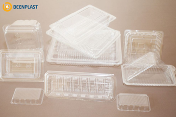 Production of plastic trays